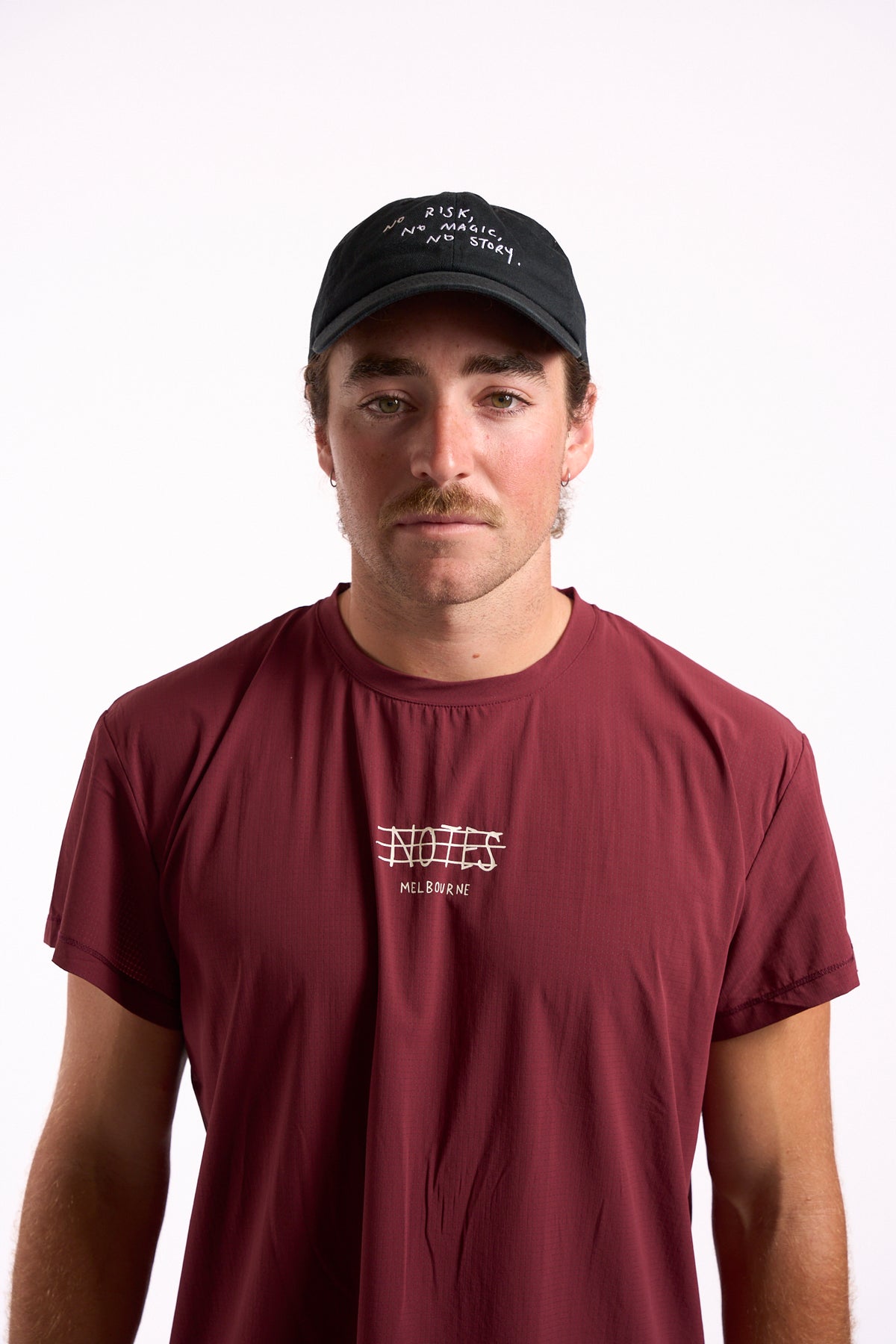 No Risk No Magic No Story cap in washed black, on model, front view