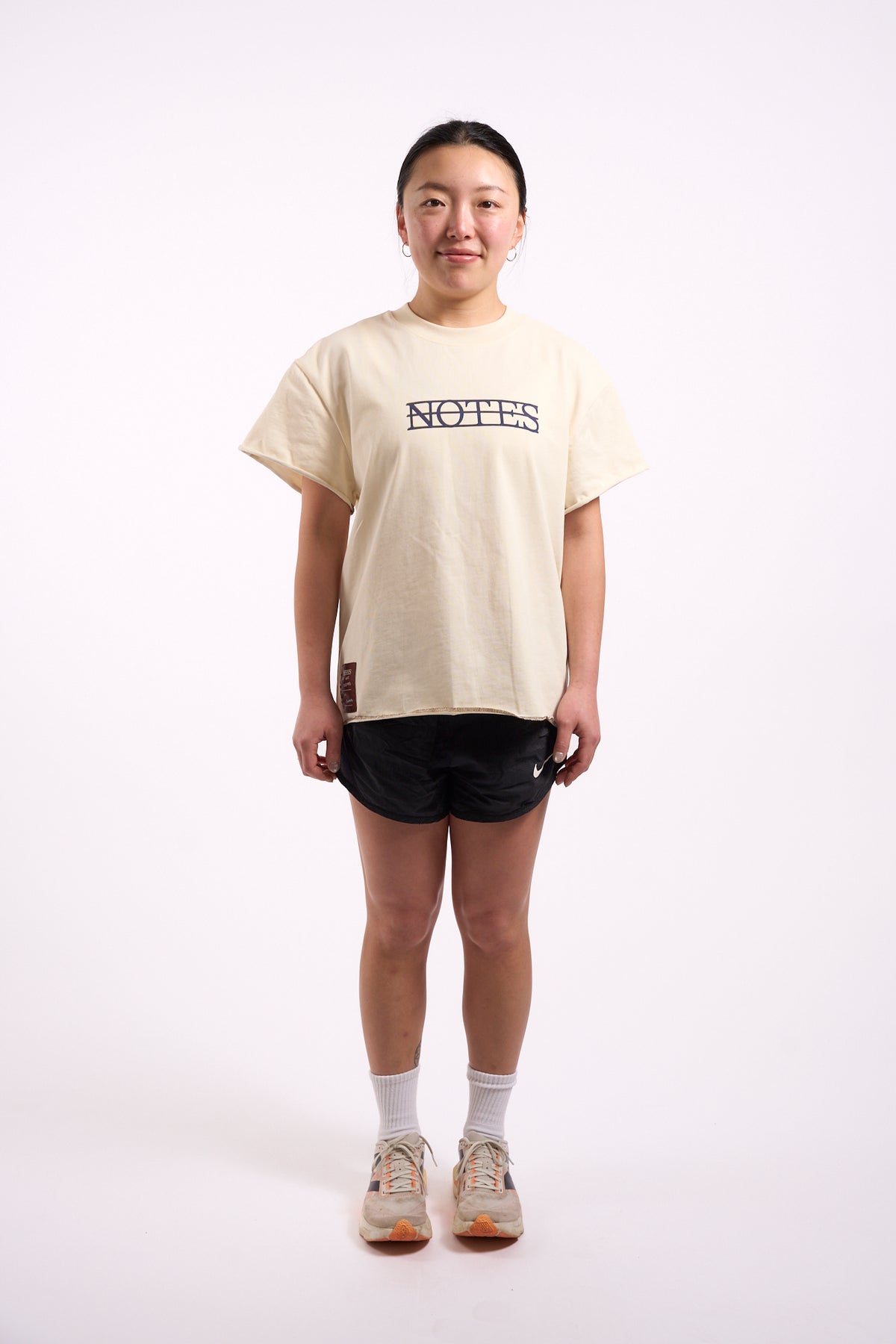 Anniversary Tee in off white, full length on model, front view