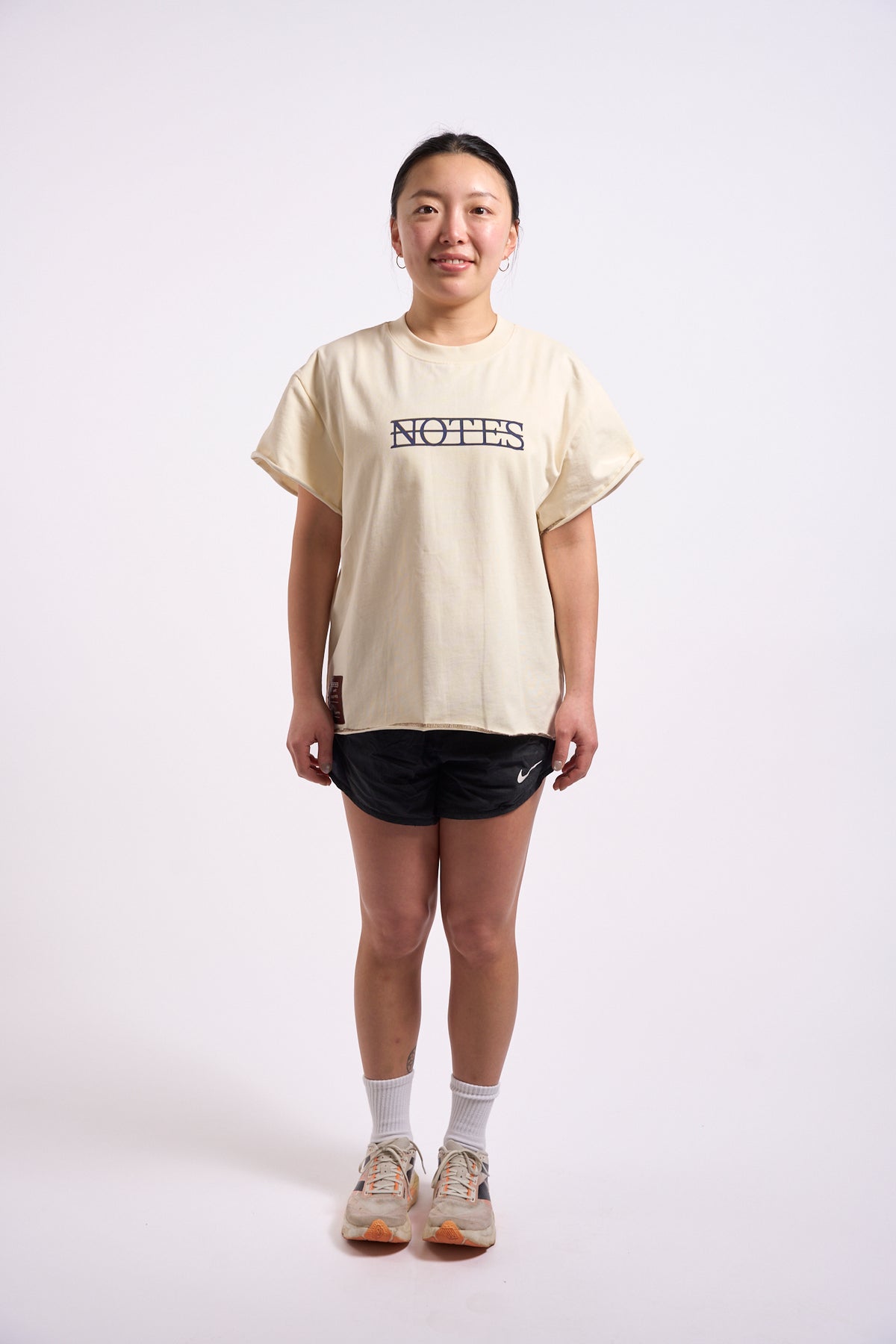Anniversary Tee in off white, full length on model, front view
