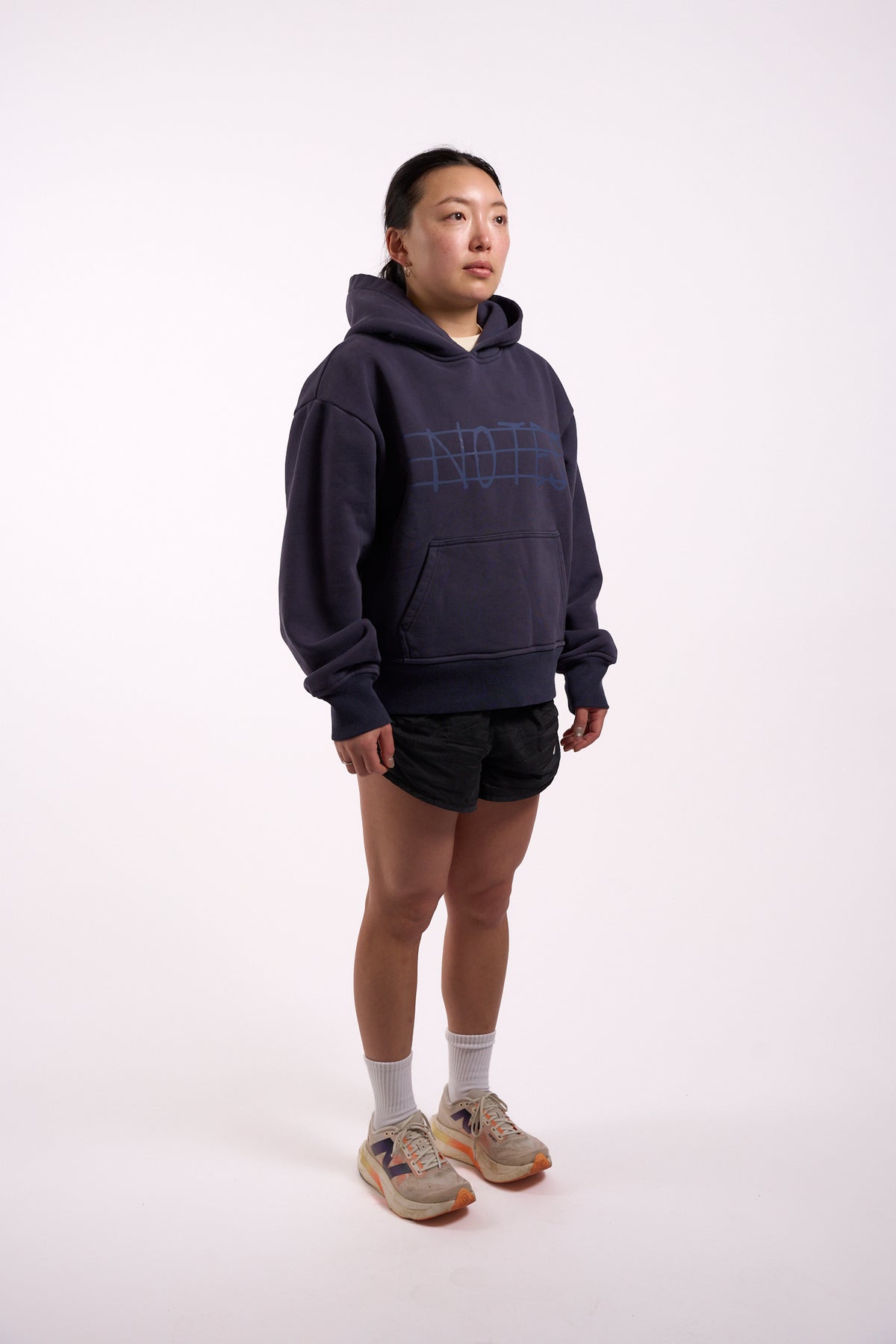 Warm Down Hoodie in Washed Pelagic Blue, full length on model, front view