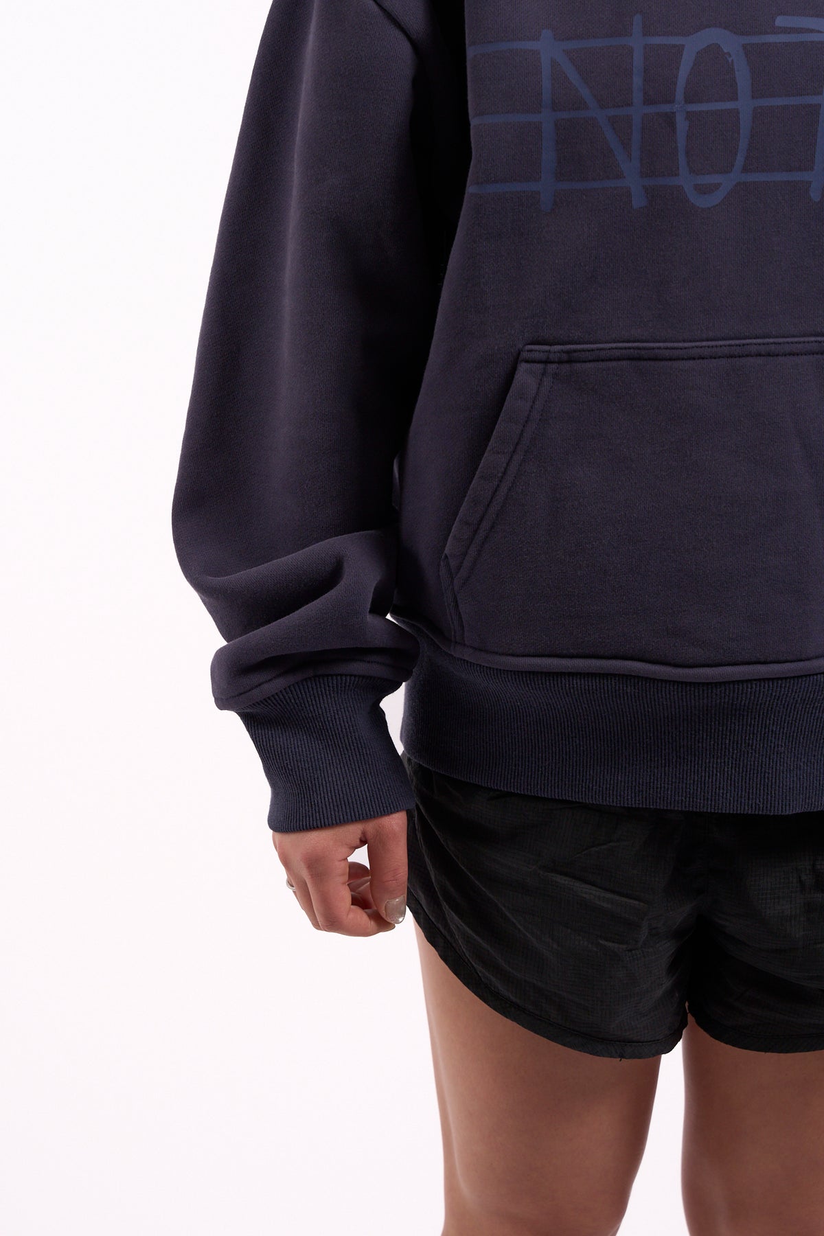 Warm Down Hoodie in Washed Pelagic Blue, close-up of pocket and cuff